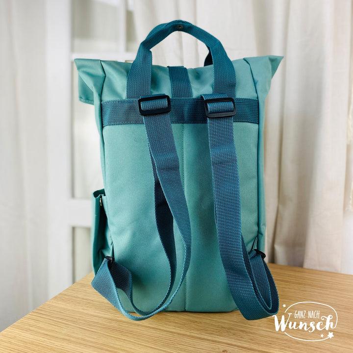 Bestickter Rolltop-Rucksack mit Stadt und Koordinaten